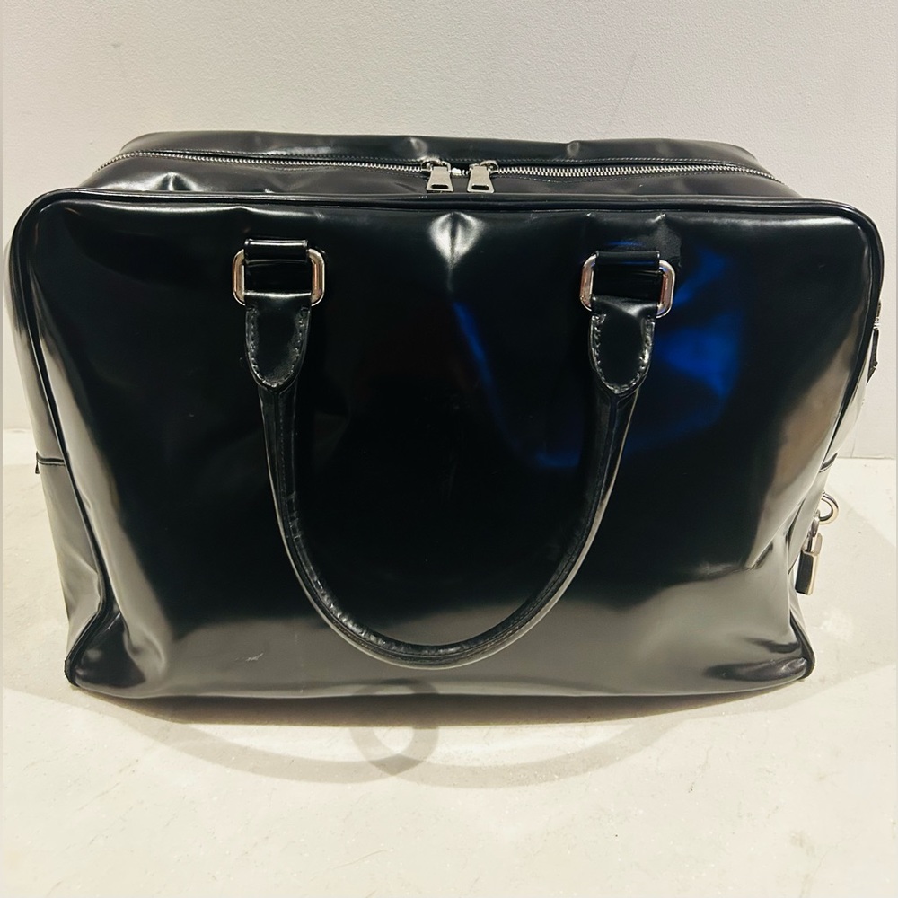 Stunning black patent leather PRADA overnight bag. Excellent condition